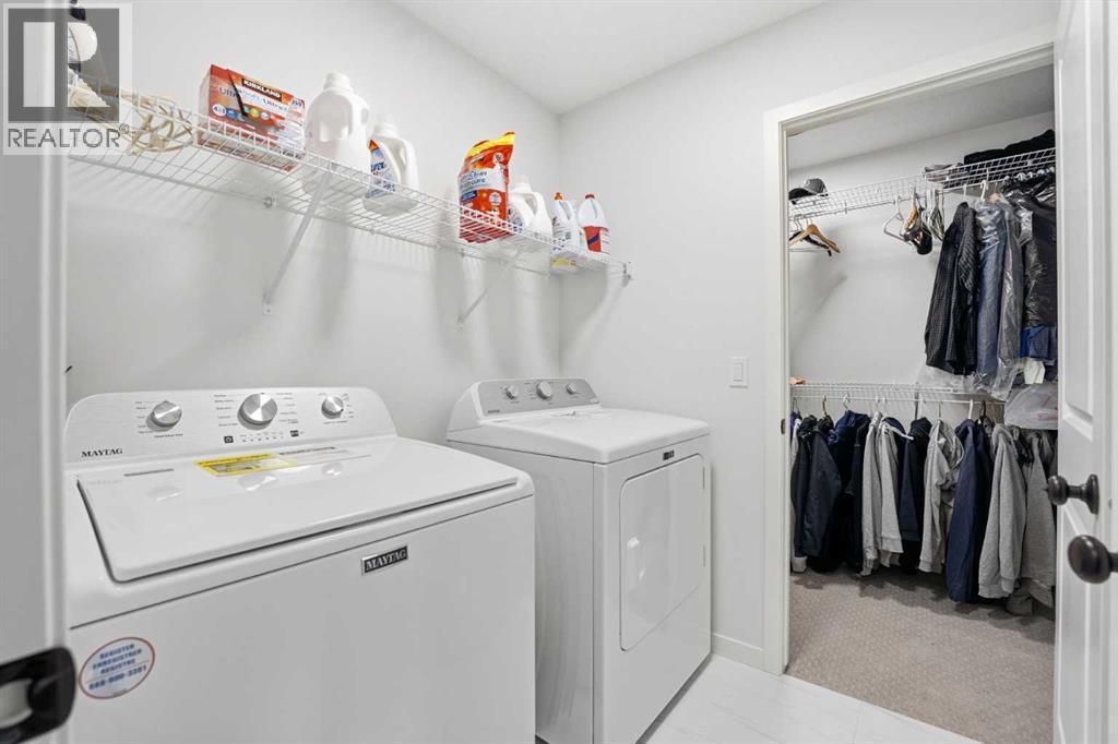102 Setonstone Manor Se, Calgary, AB - Indoor Photo Showing Laundry Room