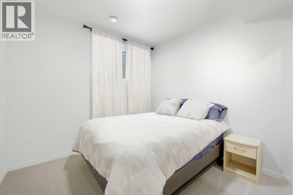102 Setonstone Manor Se, Calgary, AB - Indoor Photo Showing Bedroom
