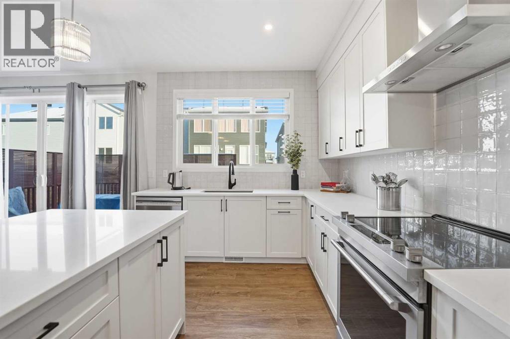 102 Setonstone Manor Se, Calgary, AB - Indoor Photo Showing Kitchen With Upgraded Kitchen