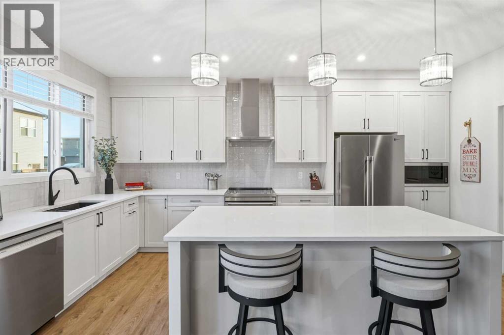 102 Setonstone Manor Se, Calgary, AB - Indoor Photo Showing Kitchen With Upgraded Kitchen