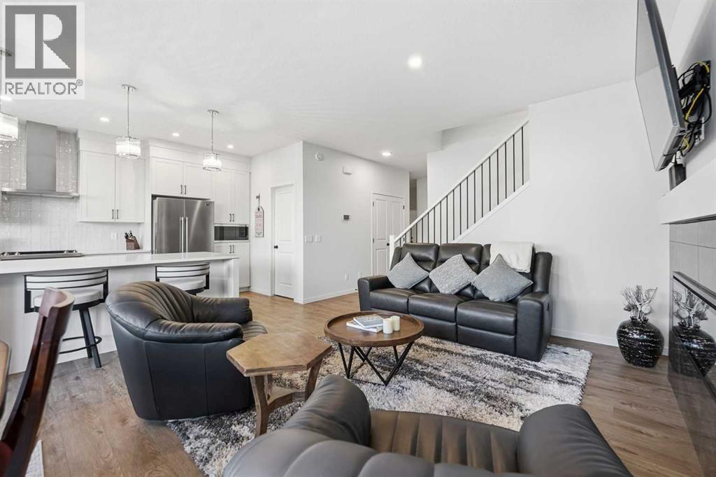 102 Setonstone Manor Se, Calgary, AB - Indoor Photo Showing Living Room