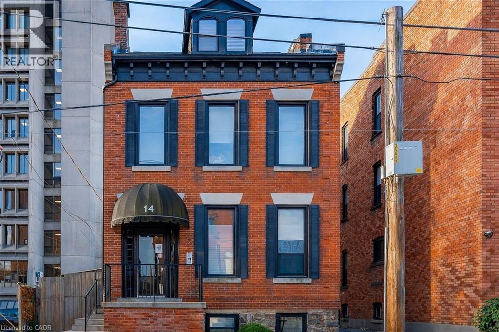 View of front facade featuring brick siding - 14 Forest Avenue, Hamilton, ON - Outdoor With Facade