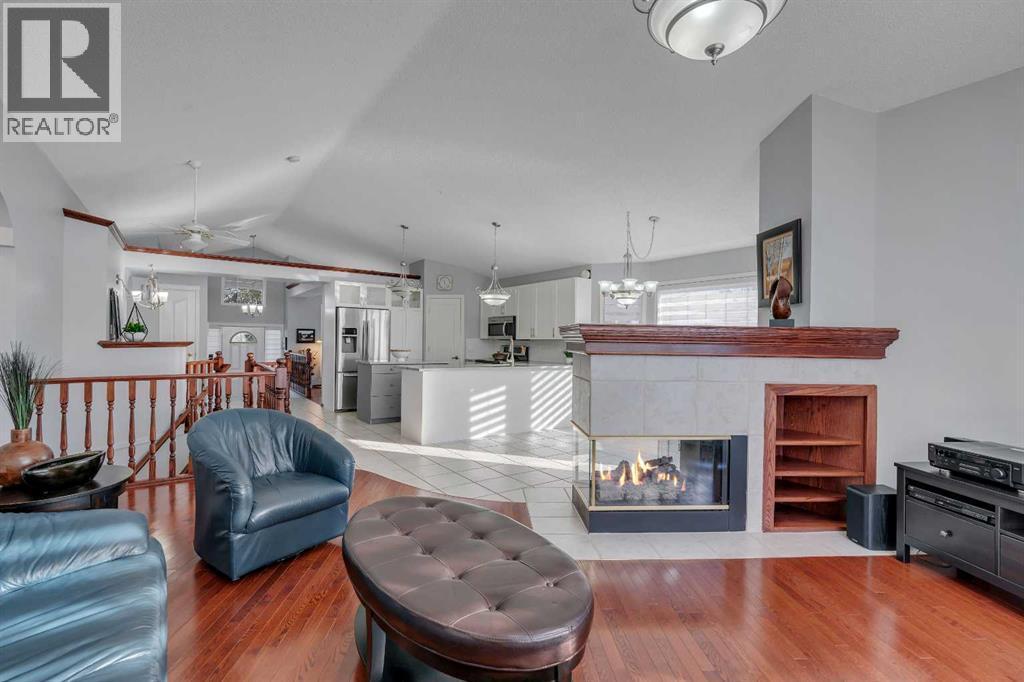 78 Mckenzie Lake Place Se, Calgary, AB - Indoor Photo Showing Living Room With Fireplace