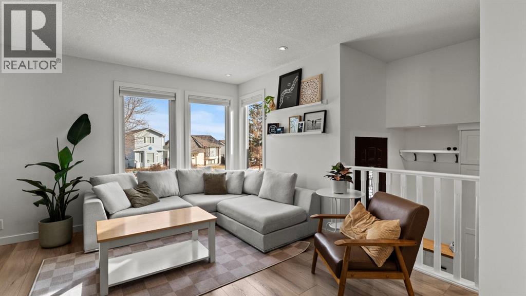 161 Macewan Glen Drive Nw, Calgary, AB - Indoor Photo Showing Living Room