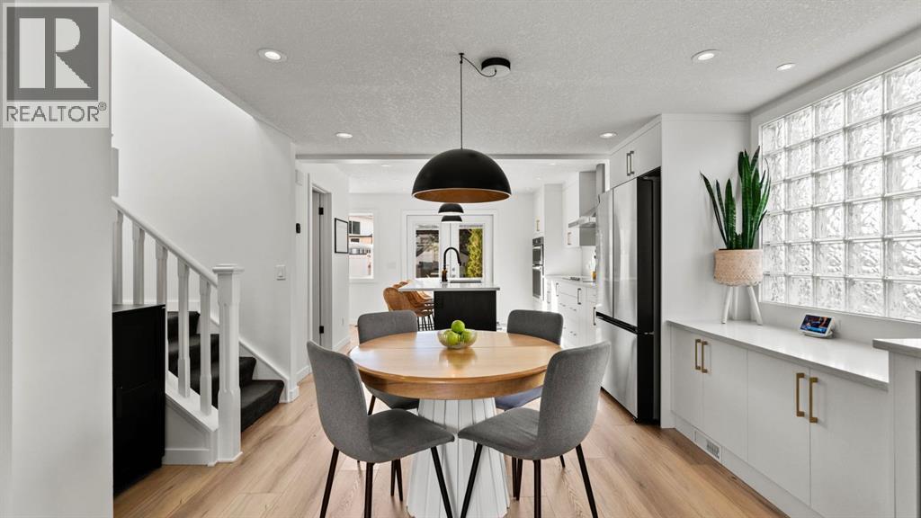 161 Macewan Glen Drive Nw, Calgary, AB - Indoor Photo Showing Dining Room