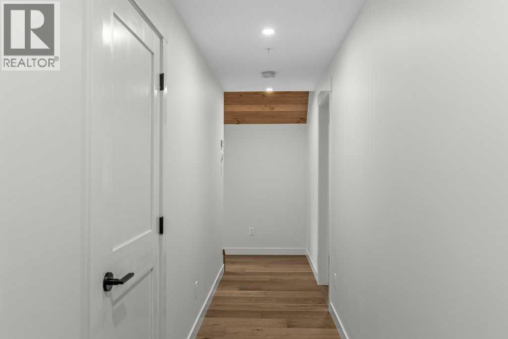 407, 1505 Spring Creek Gate, Canmore, AB - Indoor Photo Showing Other Room