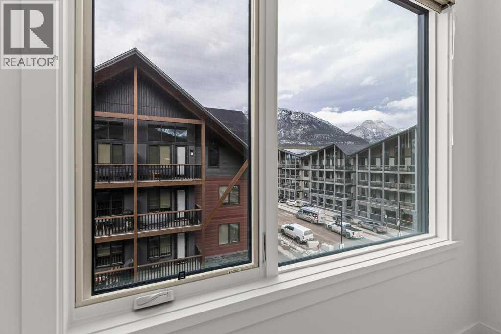 407, 1505 Spring Creek Gate, Canmore, AB - Indoor Photo Showing Other Room