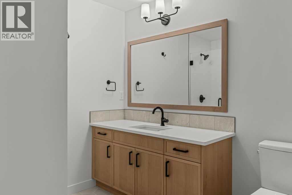 407, 1505 Spring Creek Gate, Canmore, AB - Indoor Photo Showing Bathroom