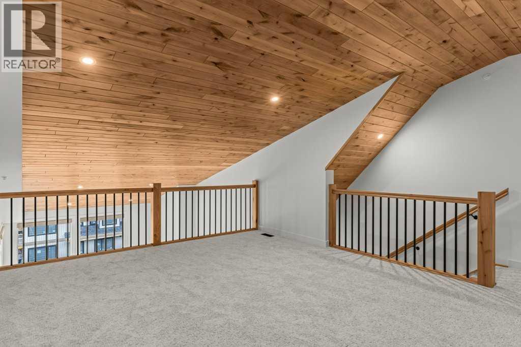 407, 1505 Spring Creek Gate, Canmore, AB - Indoor Photo Showing Other Room