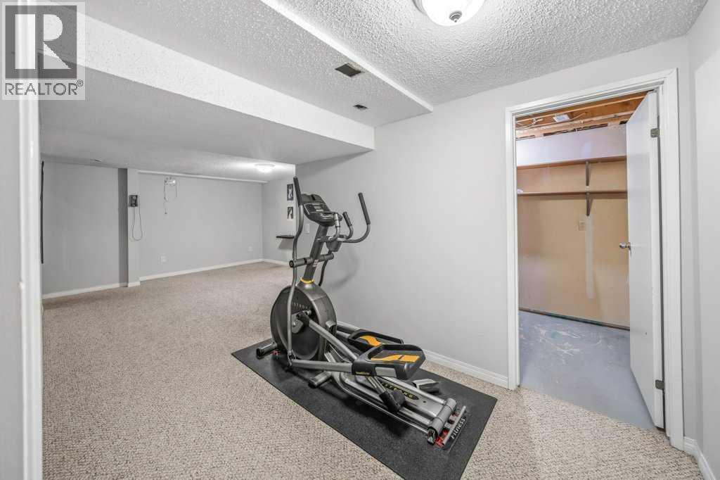 2140 146 Avenue Se, Calgary, AB - Indoor Photo Showing Gym Room