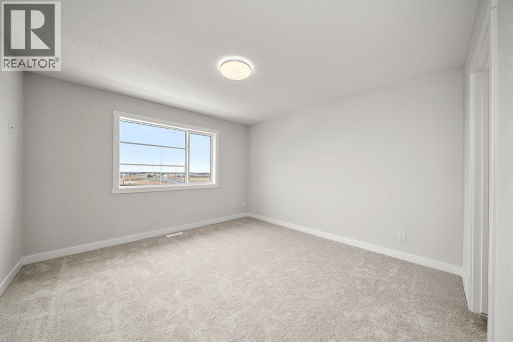 17 Sora Gate Se, Calgary, AB - Indoor Photo Showing Other Room