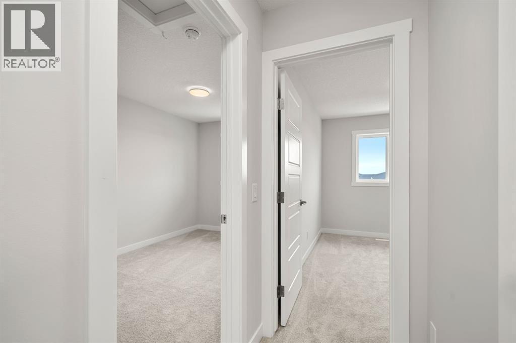 17 Sora Gate Se, Calgary, AB - Indoor Photo Showing Other Room