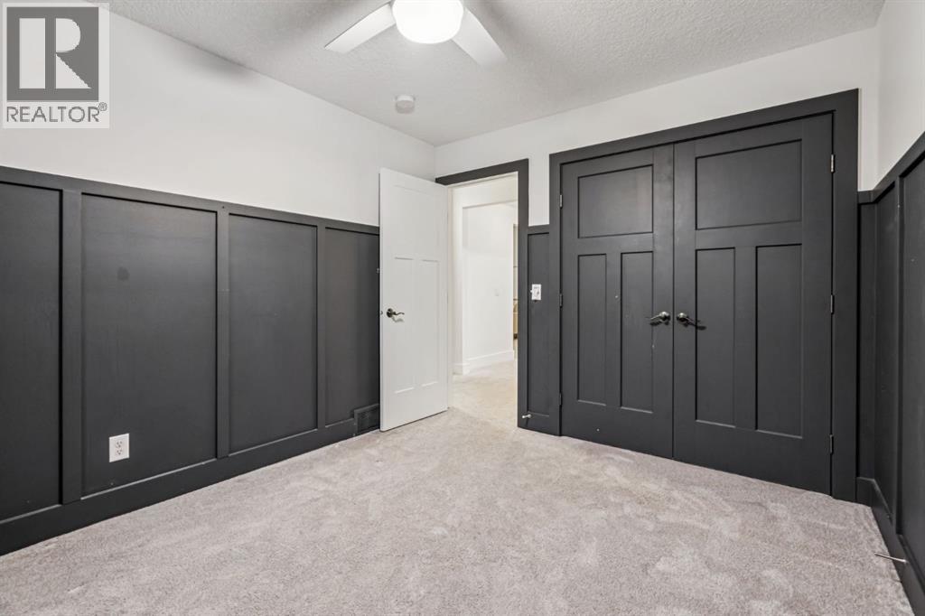 47 Sundown Way, Cochrane, AB - Indoor Photo Showing Other Room