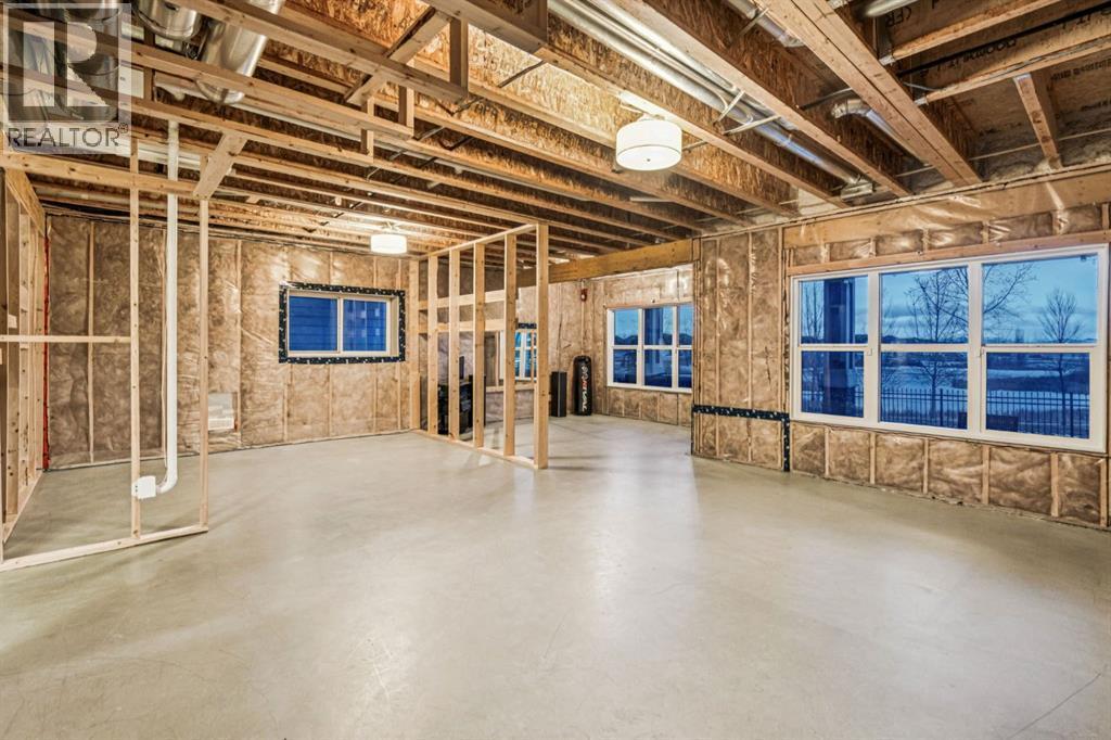 47 Sundown Way, Cochrane, AB - Indoor Photo Showing Basement