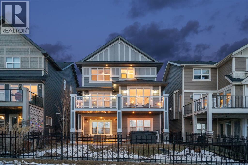 47 Sundown Way, Cochrane, AB - Outdoor With Deck Patio Veranda With Facade