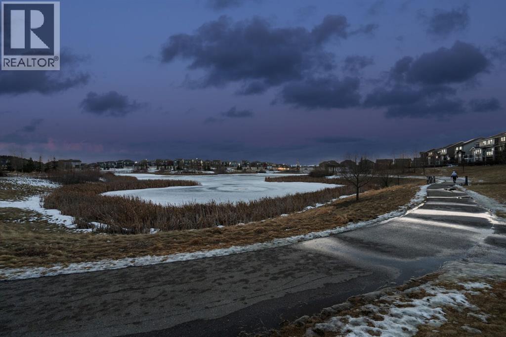 47 Sundown Way, Cochrane, AB - Outdoor With Body Of Water With View