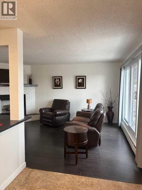 202, 11114 Hoppe, Grande Cache, AB - Indoor Photo Showing Living Room