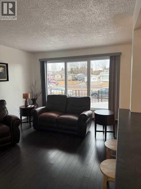 202, 11114 Hoppe, Grande Cache, AB - Indoor Photo Showing Living Room
