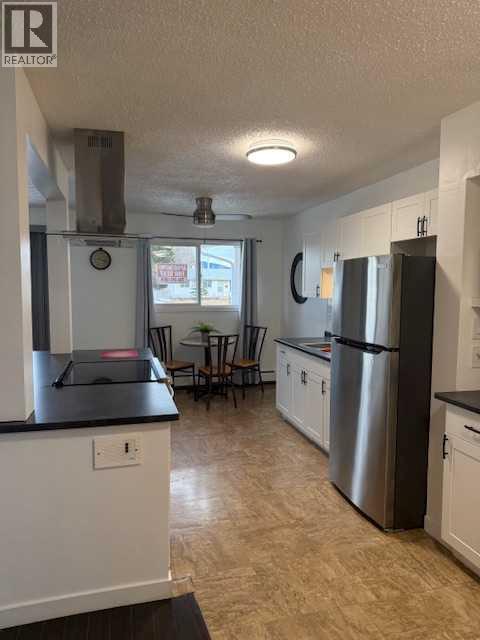 202, 11114 Hoppe, Grande Cache, AB - Indoor Photo Showing Kitchen