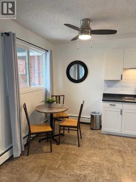 202, 11114 Hoppe, Grande Cache, AB - Indoor Photo Showing Dining Room