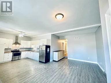 Living Room & large eat in kitchen (10ft ceilings) - Unit A - 528 Lincoln Street, Welland, ON - Indoor Photo Showing Kitchen