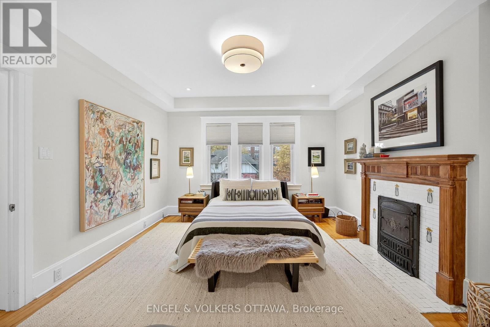 297 Clemow Avenue, Ottawa, ON - Indoor Photo Showing Bedroom With Fireplace