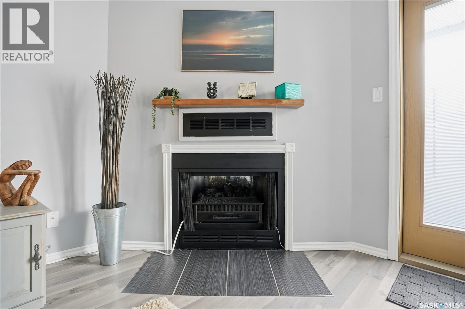 164 Cedar Meadow Drive, Regina, SK - Indoor Photo Showing Other Room With Fireplace