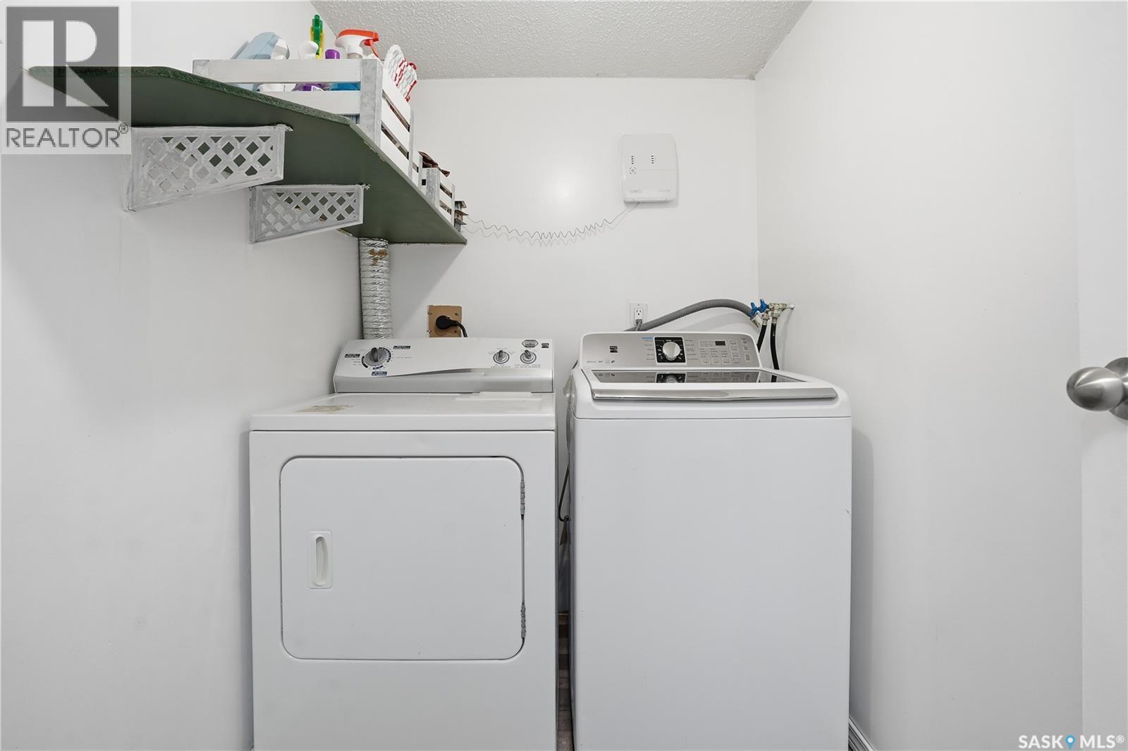 164 Cedar Meadow Drive, Regina, SK - Indoor Photo Showing Laundry Room