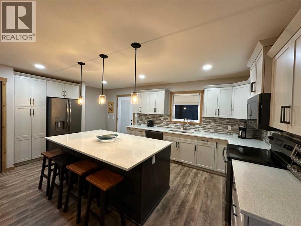 67 Ironstone Drive, Coleman, AB - Indoor Photo Showing Kitchen With Upgraded Kitchen