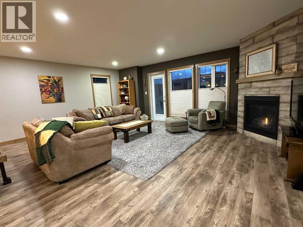 67 Ironstone Drive, Coleman, AB - Indoor With Fireplace