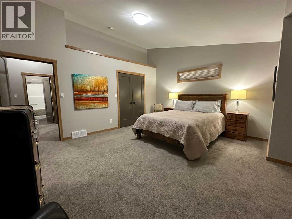 67 Ironstone Drive, Coleman, AB - Indoor Photo Showing Bedroom
