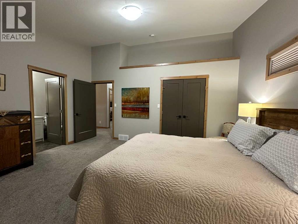 67 Ironstone Drive, Coleman, AB - Indoor Photo Showing Bedroom