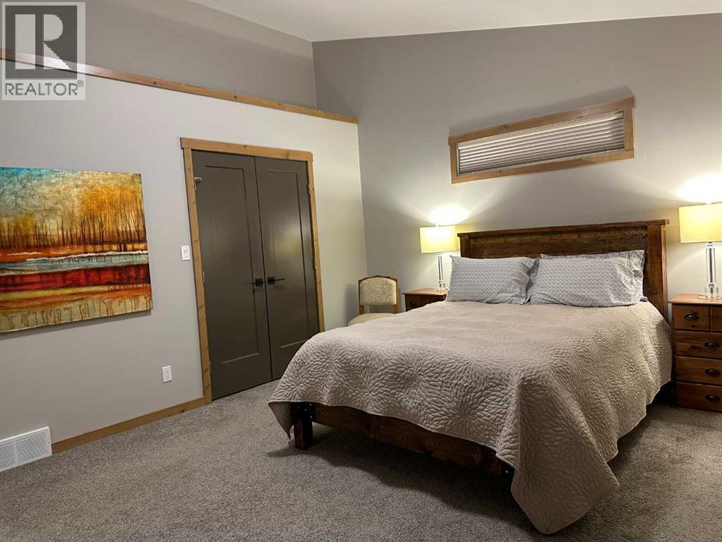 67 Ironstone Drive, Coleman, AB - Indoor Photo Showing Bedroom