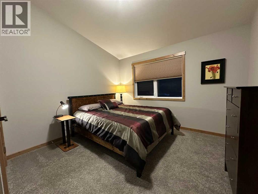 67 Ironstone Drive, Coleman, AB - Indoor Photo Showing Bedroom