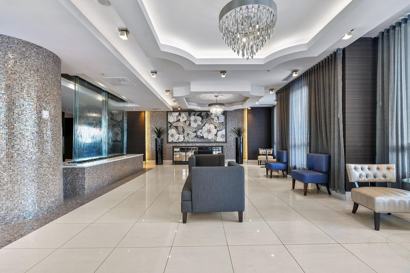 Hall - 305-3635 Av. Jean-Béraud, Laval (Chomedey), QC - Indoor Photo Showing Other Room With Fireplace