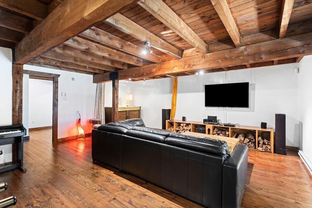 Salle familiale - 1340 Av. Morin, Chertsey, QC - Indoor Photo Showing Basement