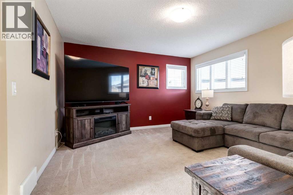 26 Mount Rae Terrace, Okotoks, AB - Indoor Photo Showing Living Room