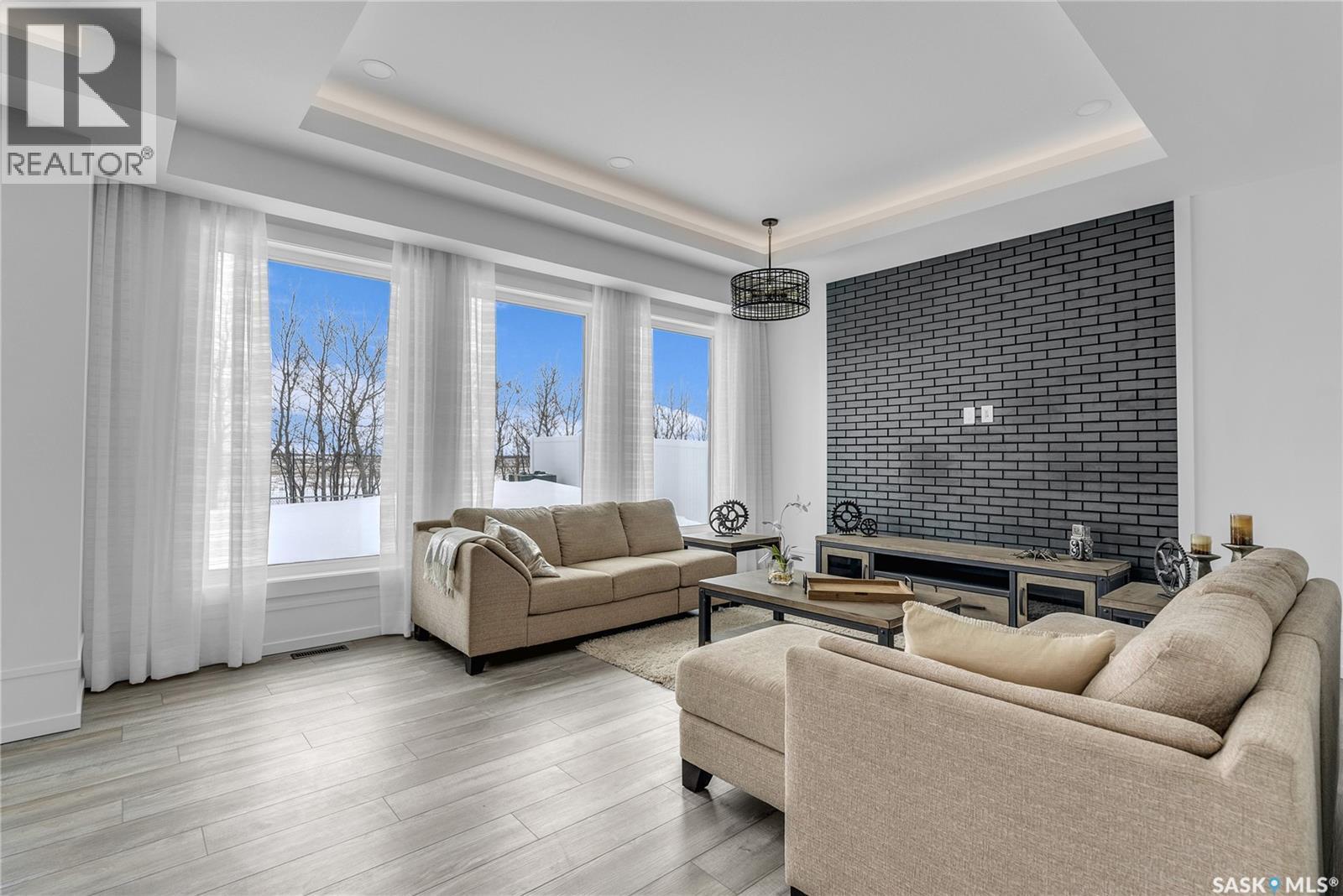 428 Woolf Bend, Saskatoon, SK - Indoor Photo Showing Living Room