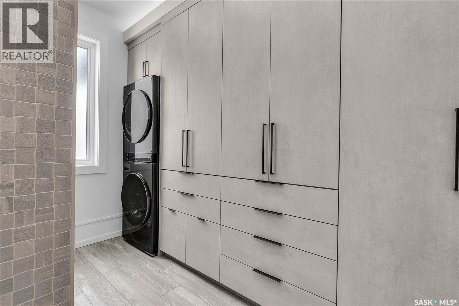 428 Woolf Bend, Saskatoon, SK - Indoor Photo Showing Laundry Room