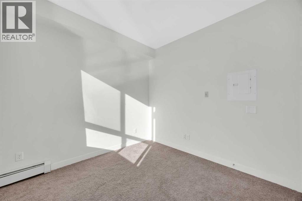 211, 10 Walgrove Walk Se, Calgary, AB - Indoor Photo Showing Other Room