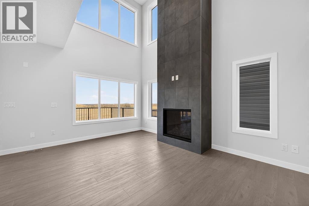 93 Walgrove Bay Se, Calgary, AB - Indoor With Fireplace