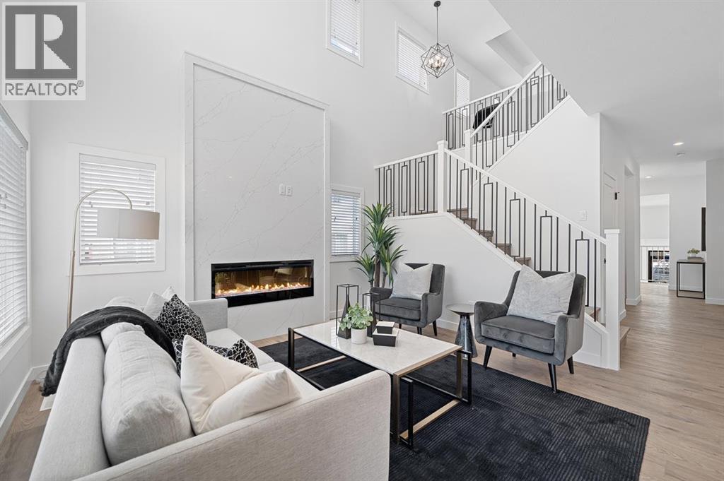 568 Walgrove Boulevard Se, Calgary, AB - Indoor Photo Showing Living Room With Fireplace