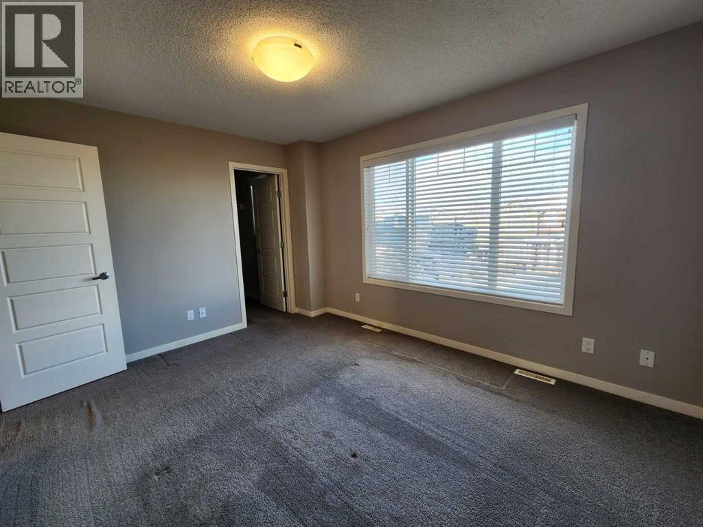 217 Panatella Walk Nw, Calgary, AB - Indoor Photo Showing Other Room
