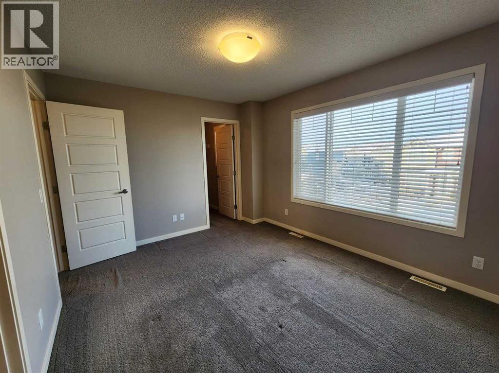 217 Panatella Walk Nw, Calgary, AB - Indoor Photo Showing Other Room