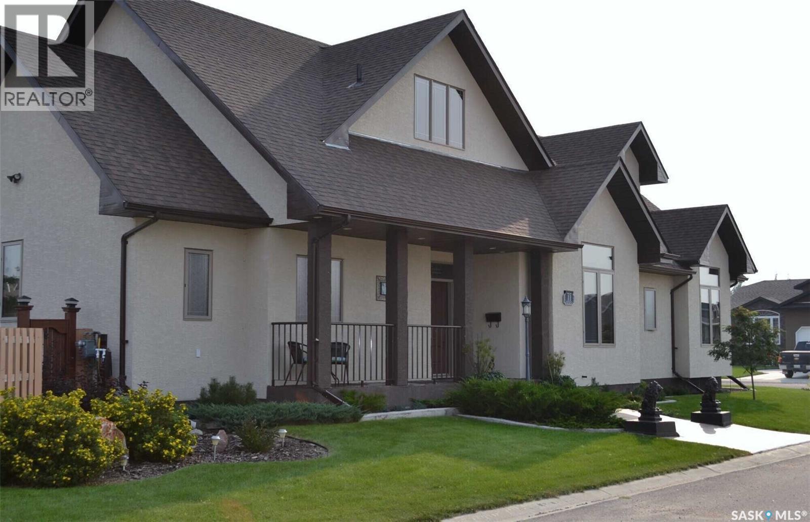 11 Robertson Road, Lanigan, SK - Outdoor With Deck Patio Veranda