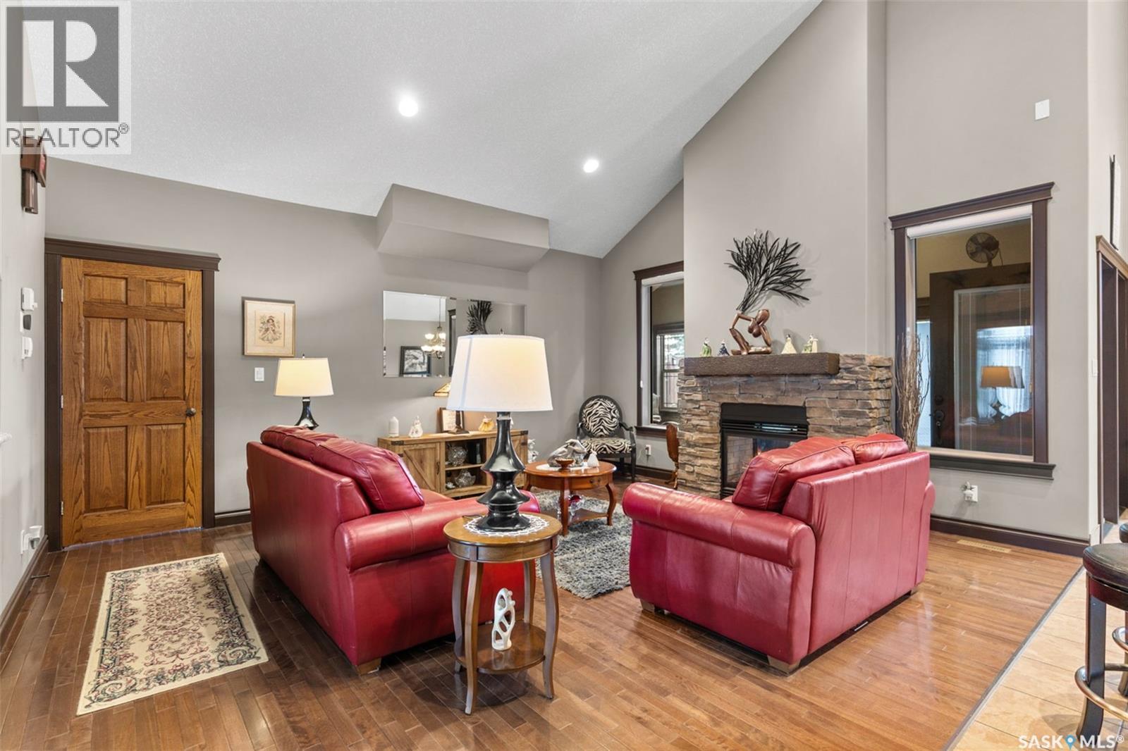 11 Robertson Road, Lanigan, SK - Indoor Photo Showing Living Room With Fireplace
