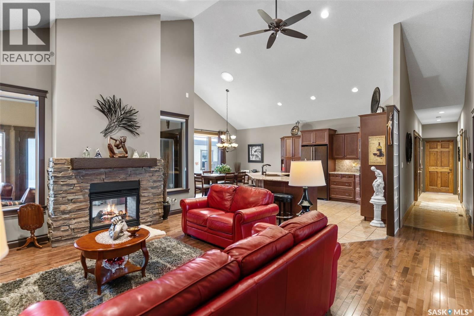 11 Robertson Road, Lanigan, SK - Indoor Photo Showing Living Room With Fireplace