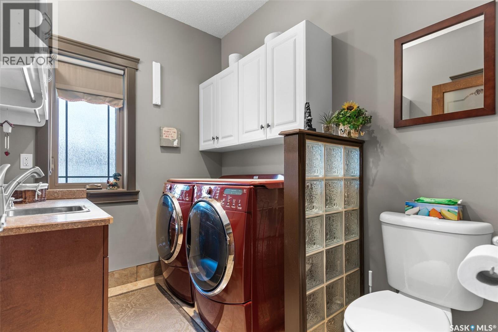 11 Robertson Road, Lanigan, SK - Indoor Photo Showing Laundry Room