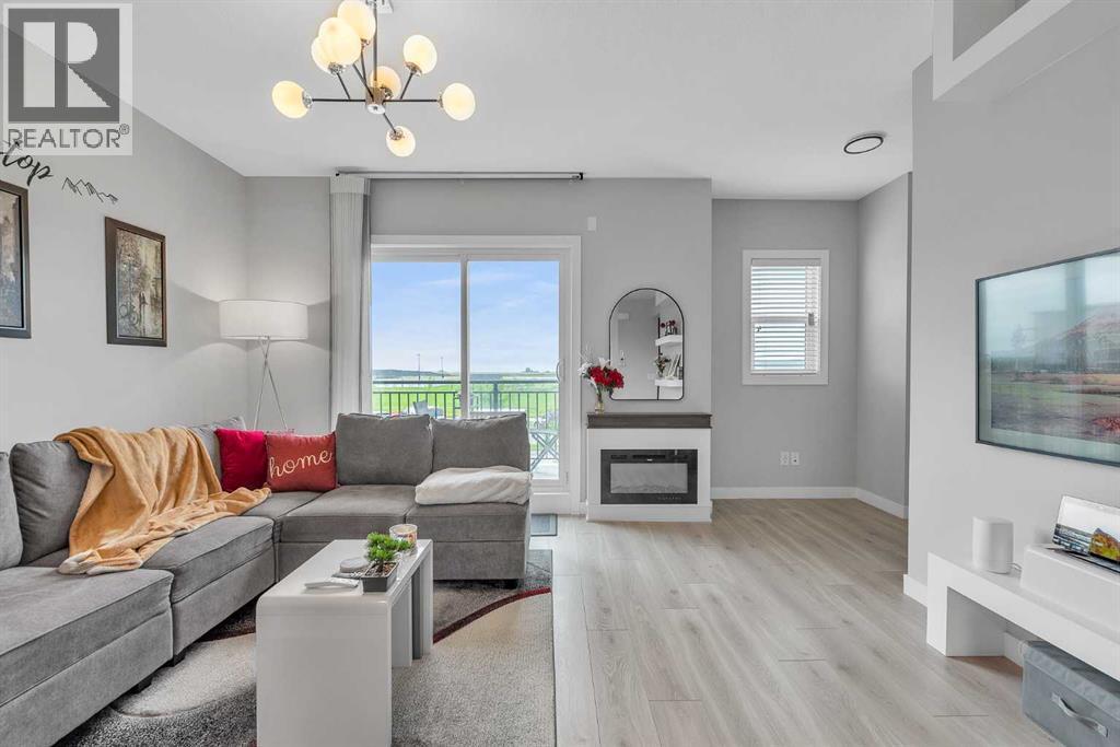 1713 Cornerstone Boulevard Ne, Calgary, AB - Indoor Photo Showing Living Room With Fireplace