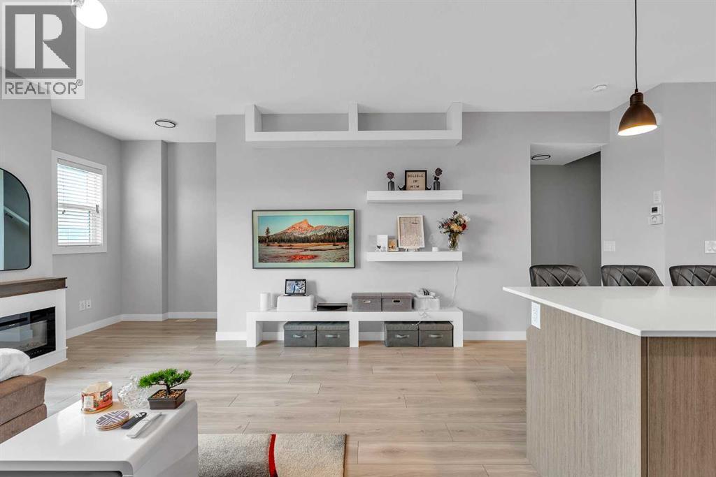 1713 Cornerstone Boulevard Ne, Calgary, AB - Indoor Photo Showing Living Room With Fireplace